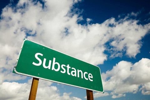 Substance road sign with dramatic clouds and sky