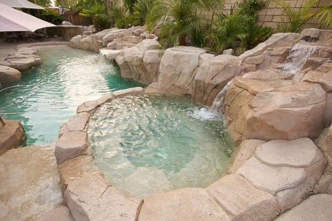 Tropical custom pool with waterfalls