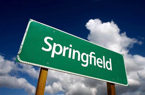 Springfield road sign with dramatic blue sky and clouds