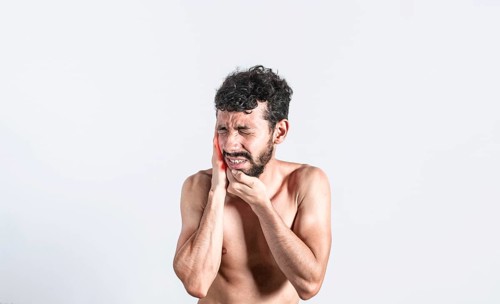 Person with earache on isolated background