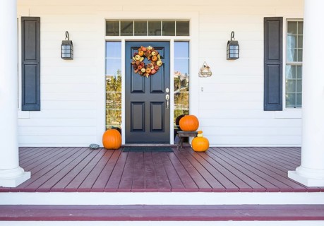Fall decoration adorns beautiful entry way to home