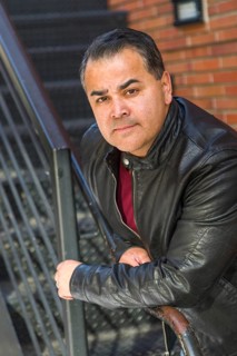 Headshot portrait of handsom hispanic man