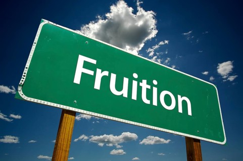 Fruition road sign with dramatic clouds and sky