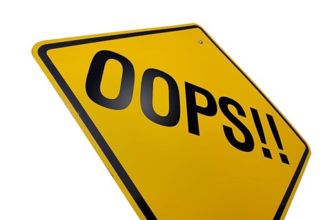 Yellow oops! road sign isolated on a white background with clipping path