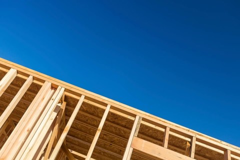 Wood home framing abstract at construction site