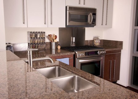Modern kitchen with brushed aluminum appliances
