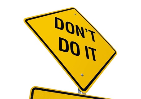 Yellow dont do it road sign isolated on a white background with clipping path