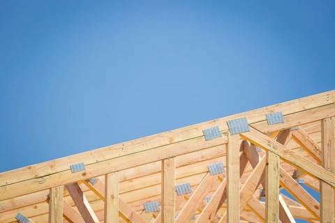 Wood home framing abstract at construction site