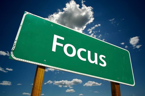 Focus road sign with dramatic blue sky and clouds