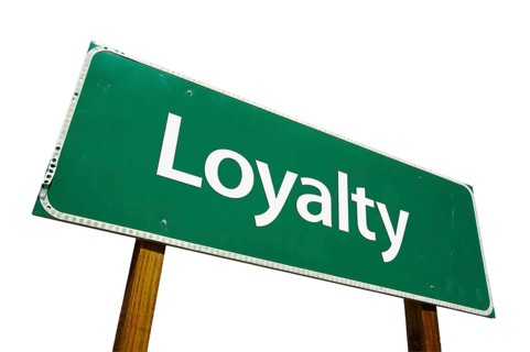 Loyalty green road sign isolated on a white background with clipping path