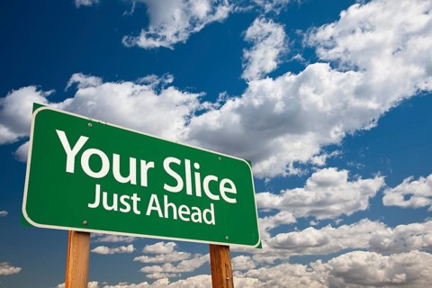 Your slice green road sign over dramatic clouds and sky