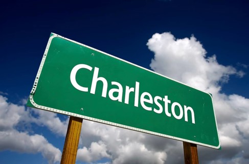 Charleston road sign with dramatic blue sky and clouds