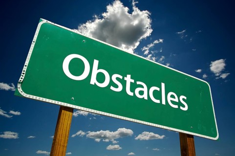 Obstacles road sign with dramatic clouds and sky