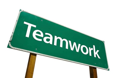 Teamwork road sign isolated on white with clipping path