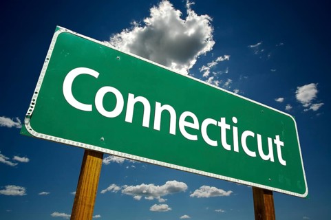 Connecticut road sign with dramatic clouds and sky