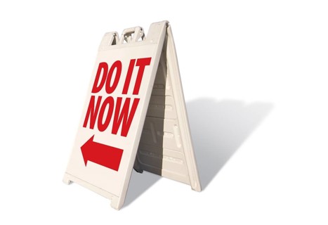 Do it now tent sign isolated on a white background