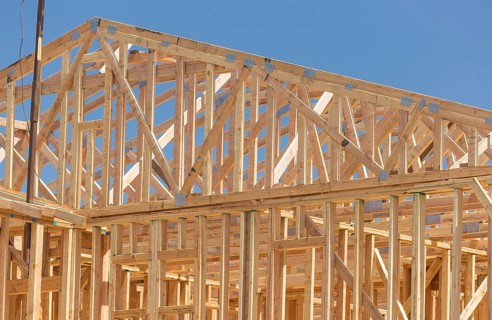 Wood home framing abstract at construction site