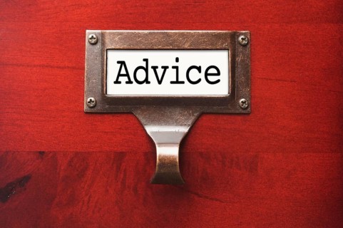 Lustrous wooden cabinet with advice file label in dramatic light