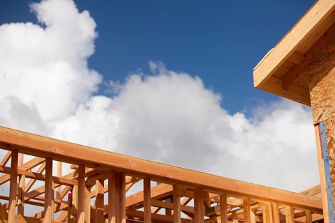 Abstract of wood home framing at construction site