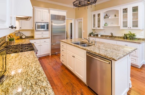 Beautiful custom kitchen interior with hard wood floors
