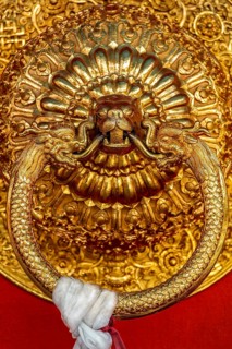 Lion shaped door handle in Buddhist temple. Kaza