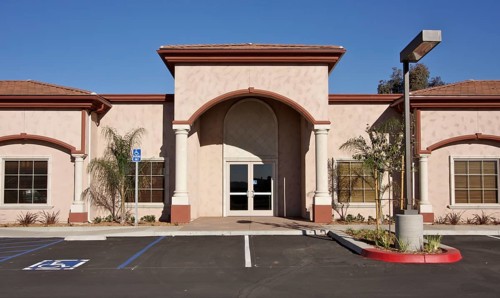 New vacant retail building and empty parking lot