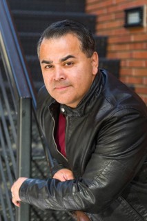 Headshot portrait of handsom hispanic man