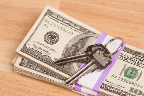 House keys on stack of money
