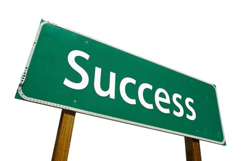 Success road sign isolated on white with clipping path