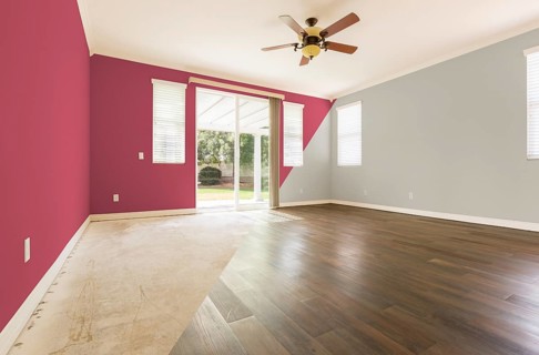 Empty room with cross section showing before and after with new wood floor and paint