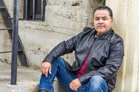 Headshot portrait of handsom hispanic man