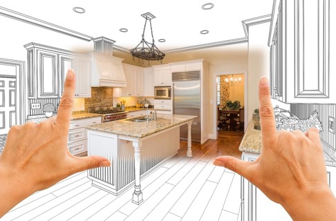 Female hands framing custom kitchen design drawing and square photo combination