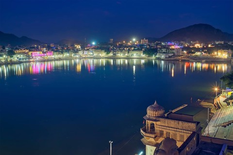 Night view of famous indian hinduism pilgrimage town sacred holy hindu religious city Pushkar with Brahma temple