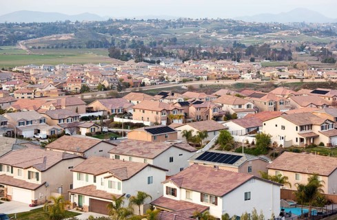 Contemporary neighborhood houses roof tops and horizon view