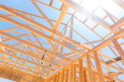 Wood home framing abstract at construction site