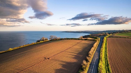 Devon Fields and Farmlands at sunset time from a drone over Labrador Bay