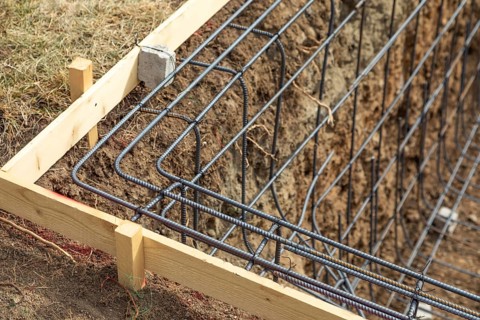 New steel rebar framing abstract at construction site