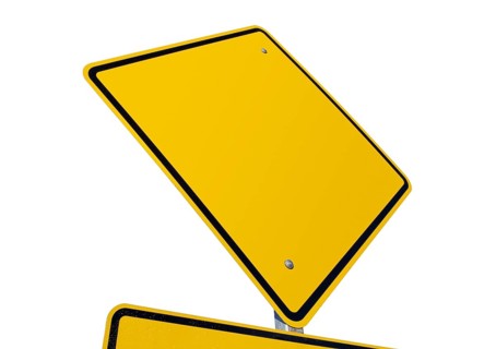 Blank yellow road sign isolated on a white background with clipping path