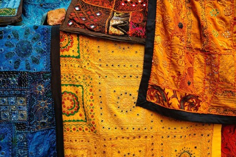 Indian patchwork fabric with traditional Indian patterns close up. Jasialmer