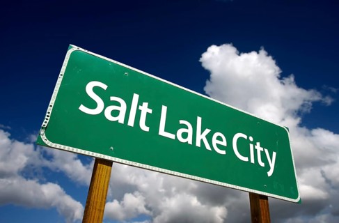Salt lake city road sign with dramatic blue sky and clouds