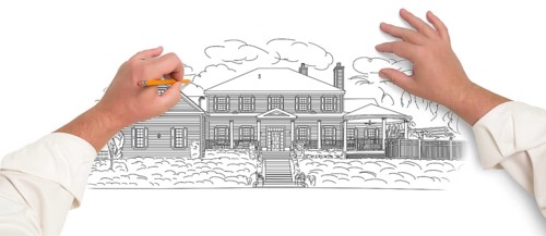 Male hands sketching with pencil the outline of a beautiful house on white