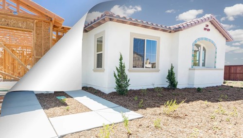 Completed house with page corner flipping to construction framing behind