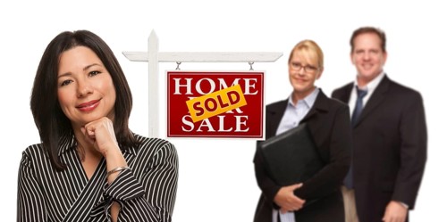 mixed-race people with sold home for sale real estate sign isolated on a white background