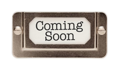 Coming soon file drawer label isolated on a white background