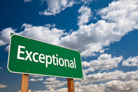Exceptional green road sign with dramatic clouds and sky