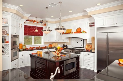 Beautiful custom kitchen interior with fall decorations in a new house