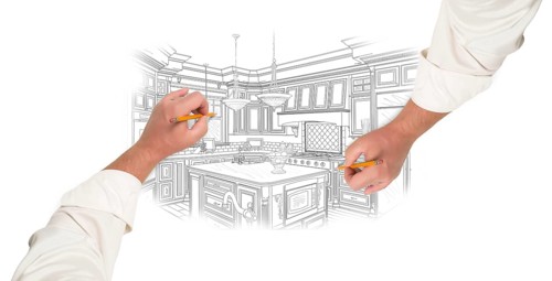 Two male hands sketching with pencil the outline of a beautiful custom kitchen