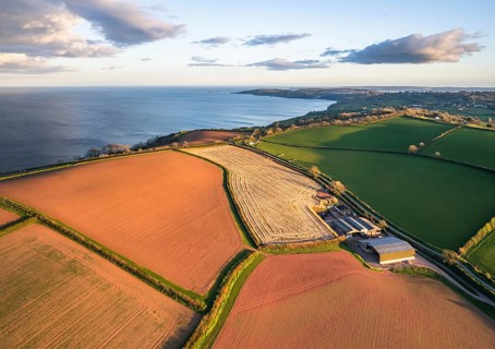 Devon Fields and Farmlands at sunset time from a drone over Labrador Bay