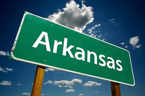 Arkansas road sign with dramatic clouds and sky