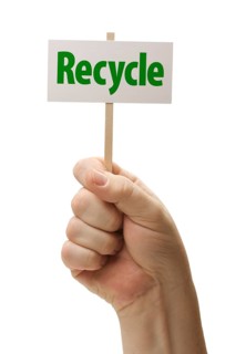 Recycle sign in male fist isolated on A white background